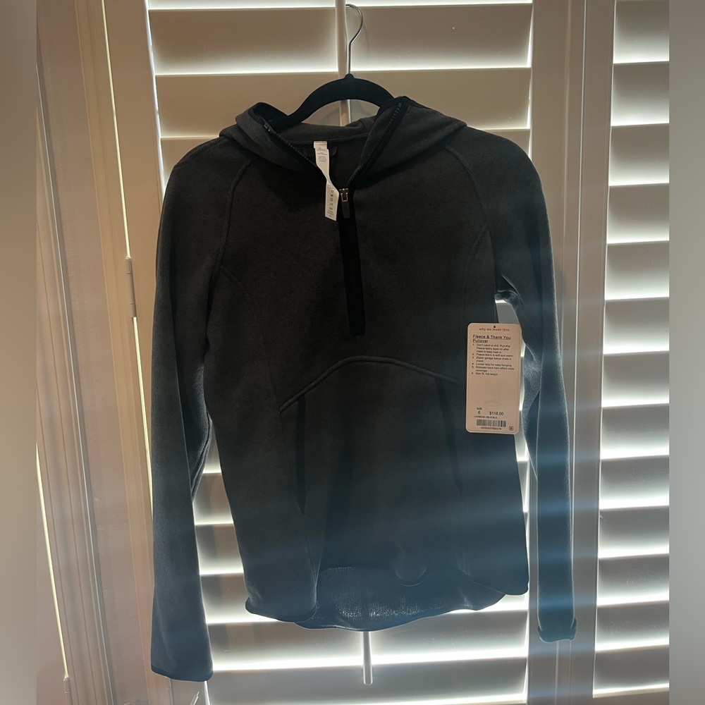 NWT. Size Six Lululemon. Fleece half zip pull over.
